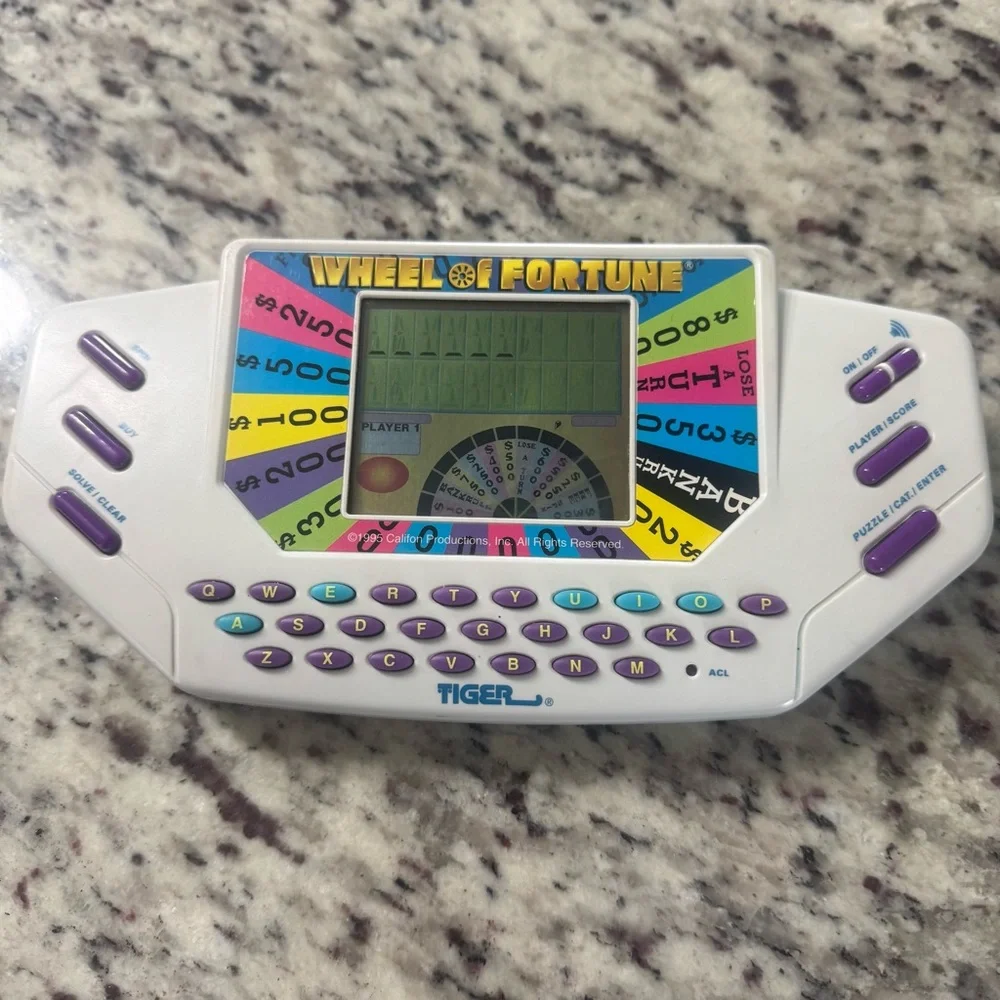 Tiger Wheel of Fortune Handheld Game 1995 – Tested & Working with Sound‎
